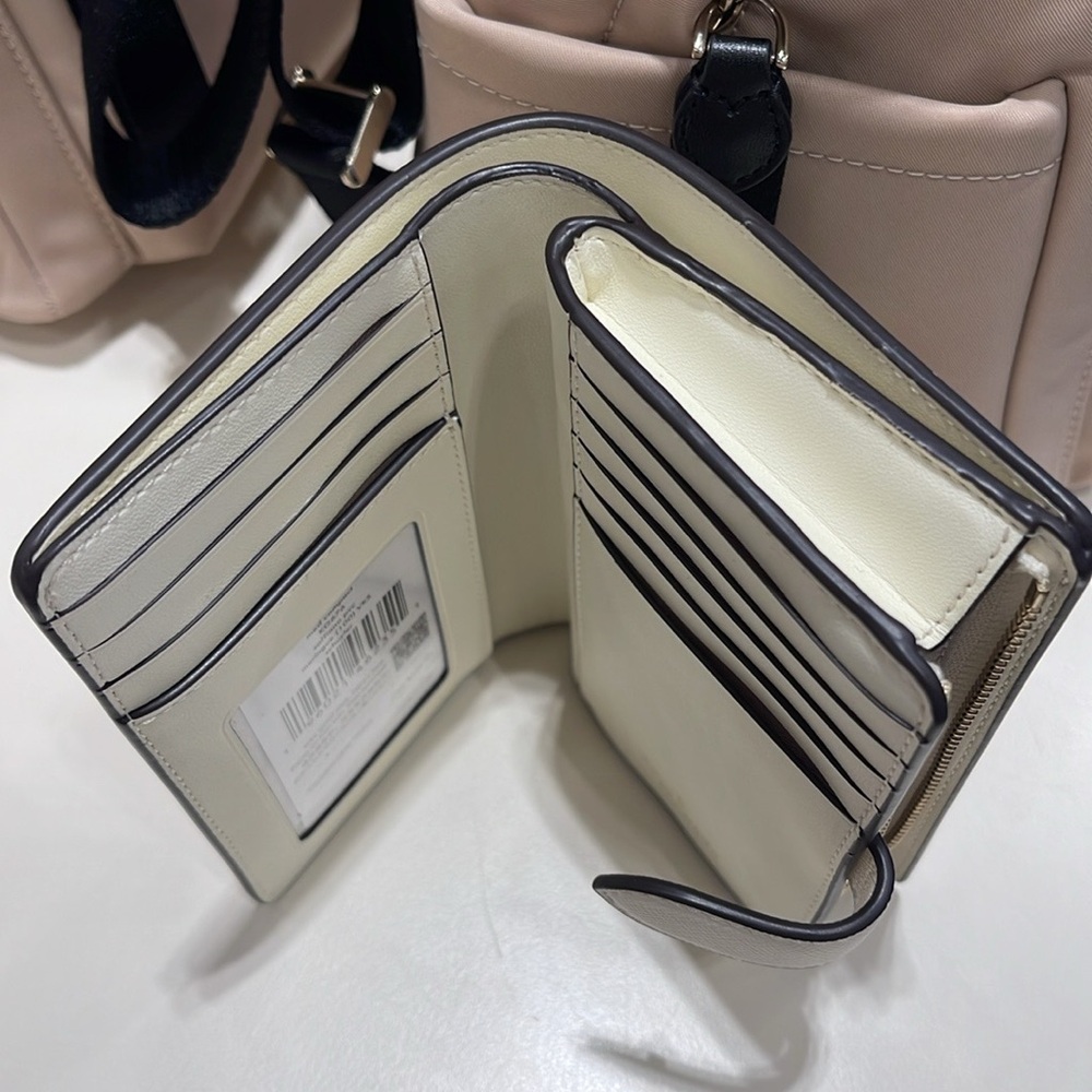 Kate Spade Schuyler Medium Compact Bifold Wallet
Meringue 
NWT - Picture 10 of 16